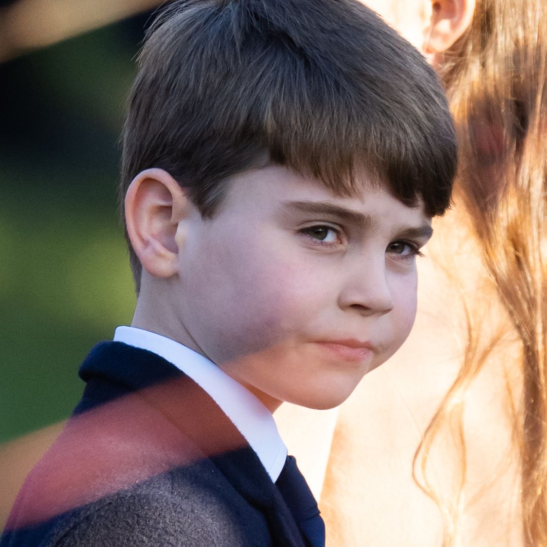 Prince Louis snatches Christmas present from Prince William in hilarious moment - watch