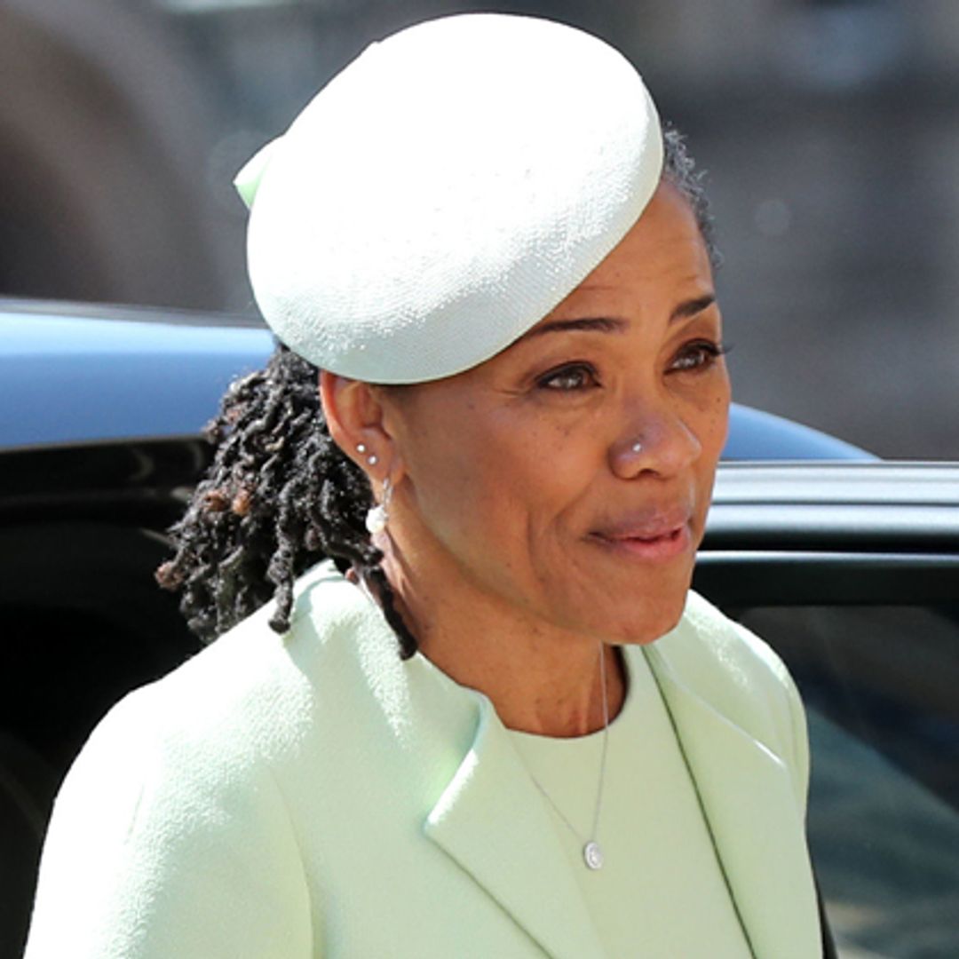 Meghan Markle's mom Doria Ragland is a glowing grandmother as she cradles Prince Archie
