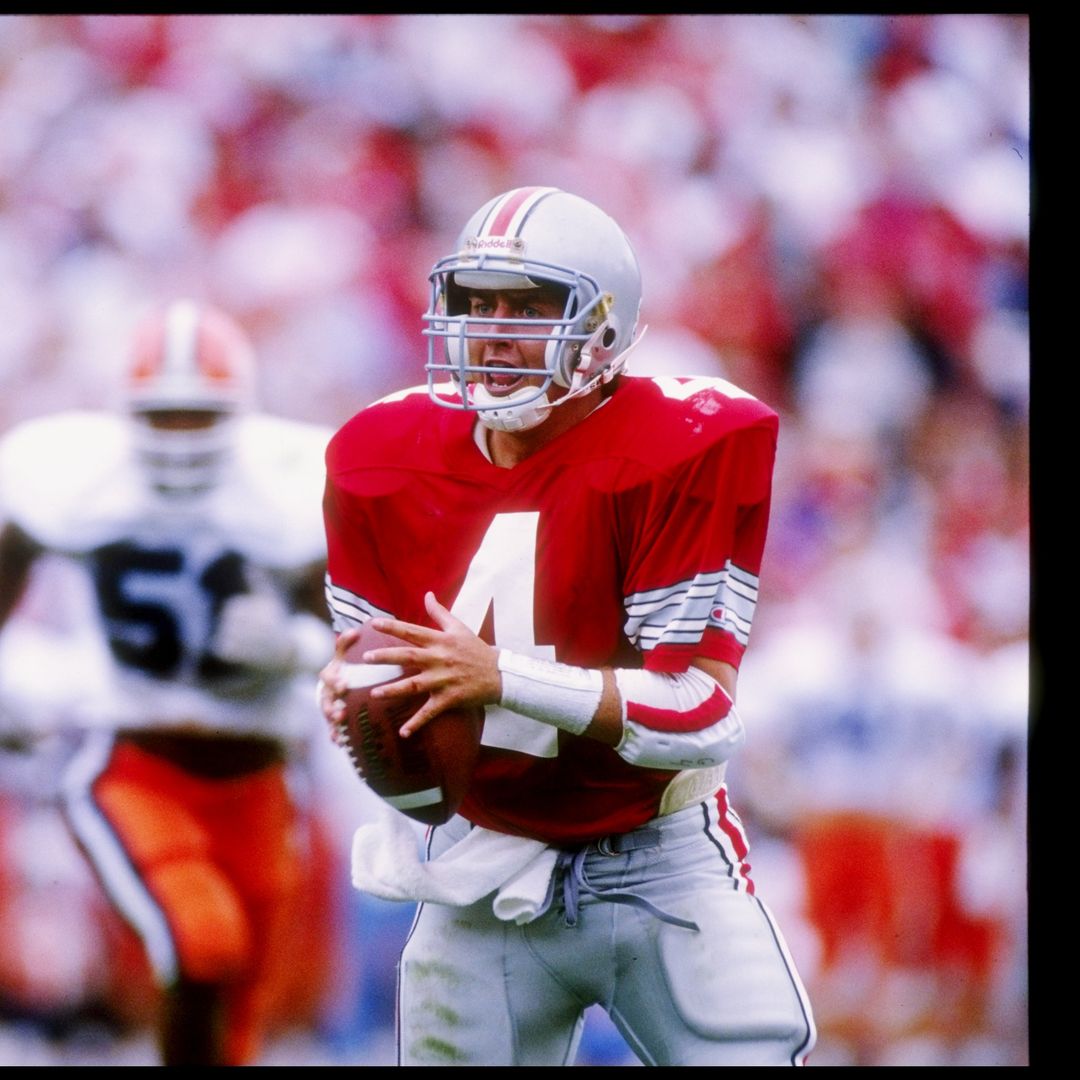 Quarterback Kirk Herbstreit of the Ohio State Buckeyes looks to pass the ball during a game against the Illinois Fighting Illini at Ohio Stadium in Columbus, Ohio.  Illinois won the game 18-16.