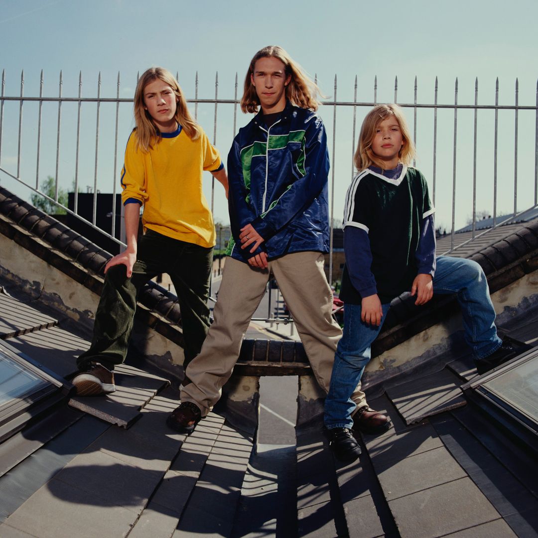 American pop band Hanson pose for a group portrait on a roof in London in 1997 L-R Taylor Hanson, Isaac Hanson and Zac Hanson. (Photo by Mike Prior/Getty Images)