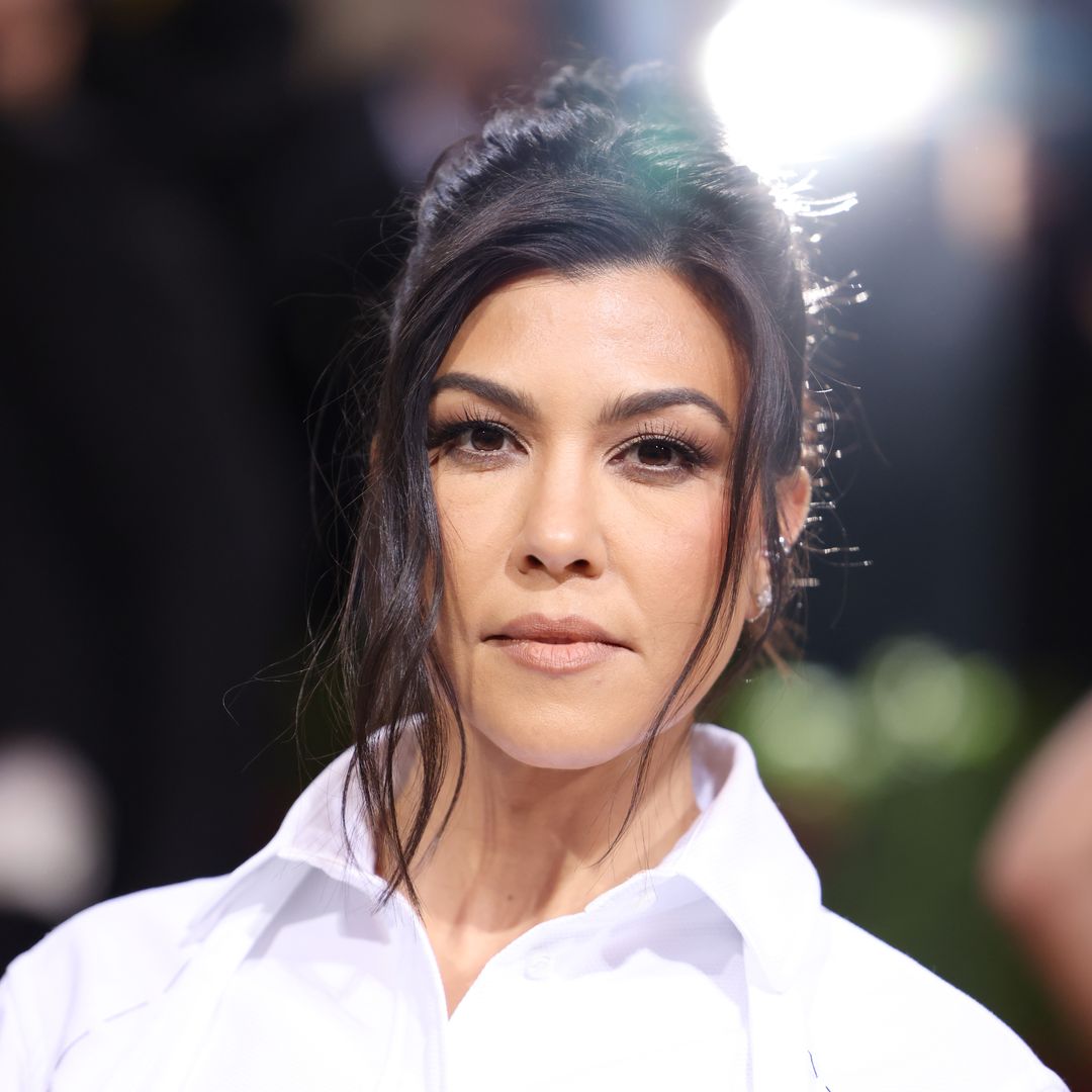 Kourtney Kardashian poses in a bikini in photo unearthed by stepdaughter Alabama