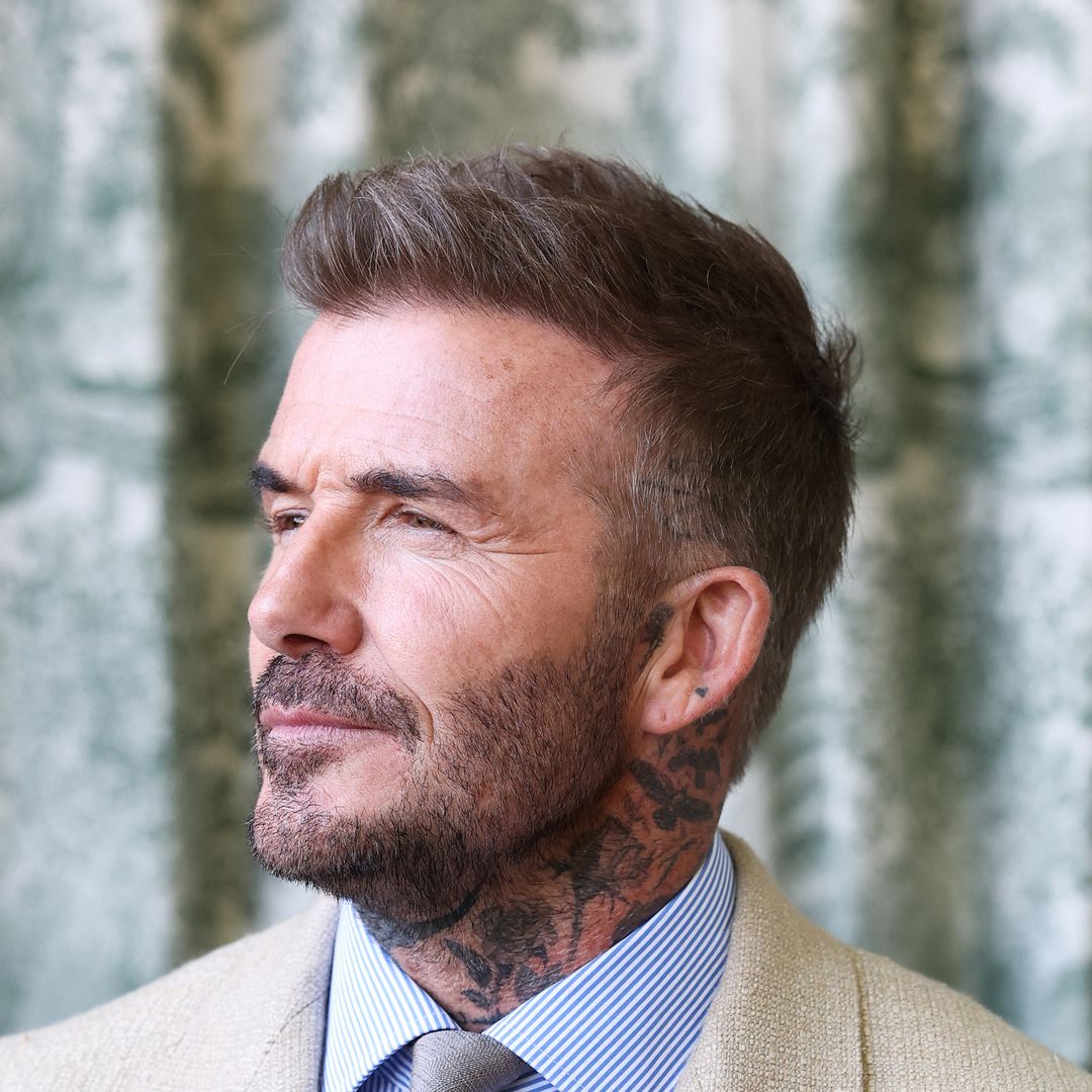 David Beckham's 5-word family confession to King Charles revealed by lip reader
