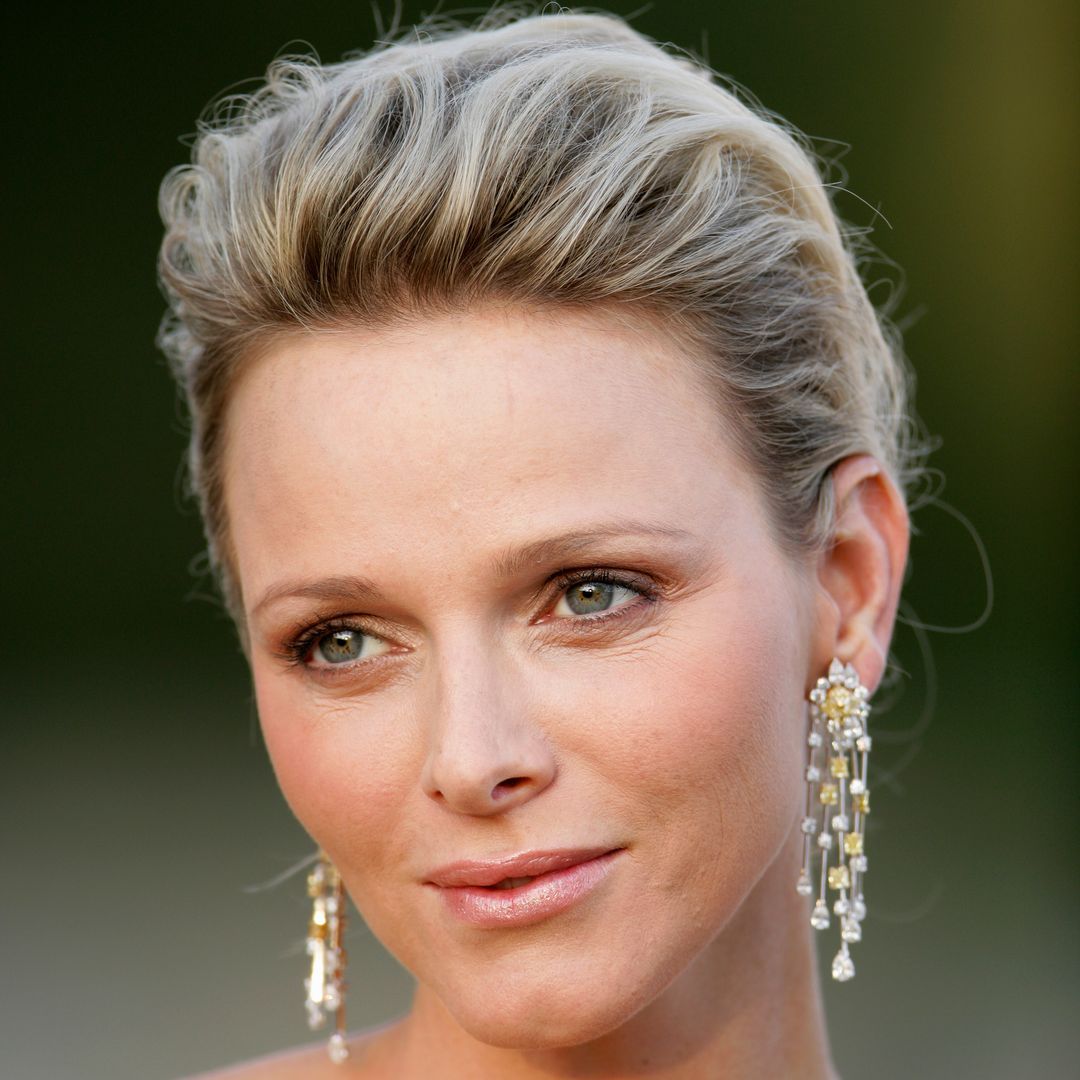 Princess Charlene is unrecognisable in unearthed photo with wet-look hair and vampy makeup