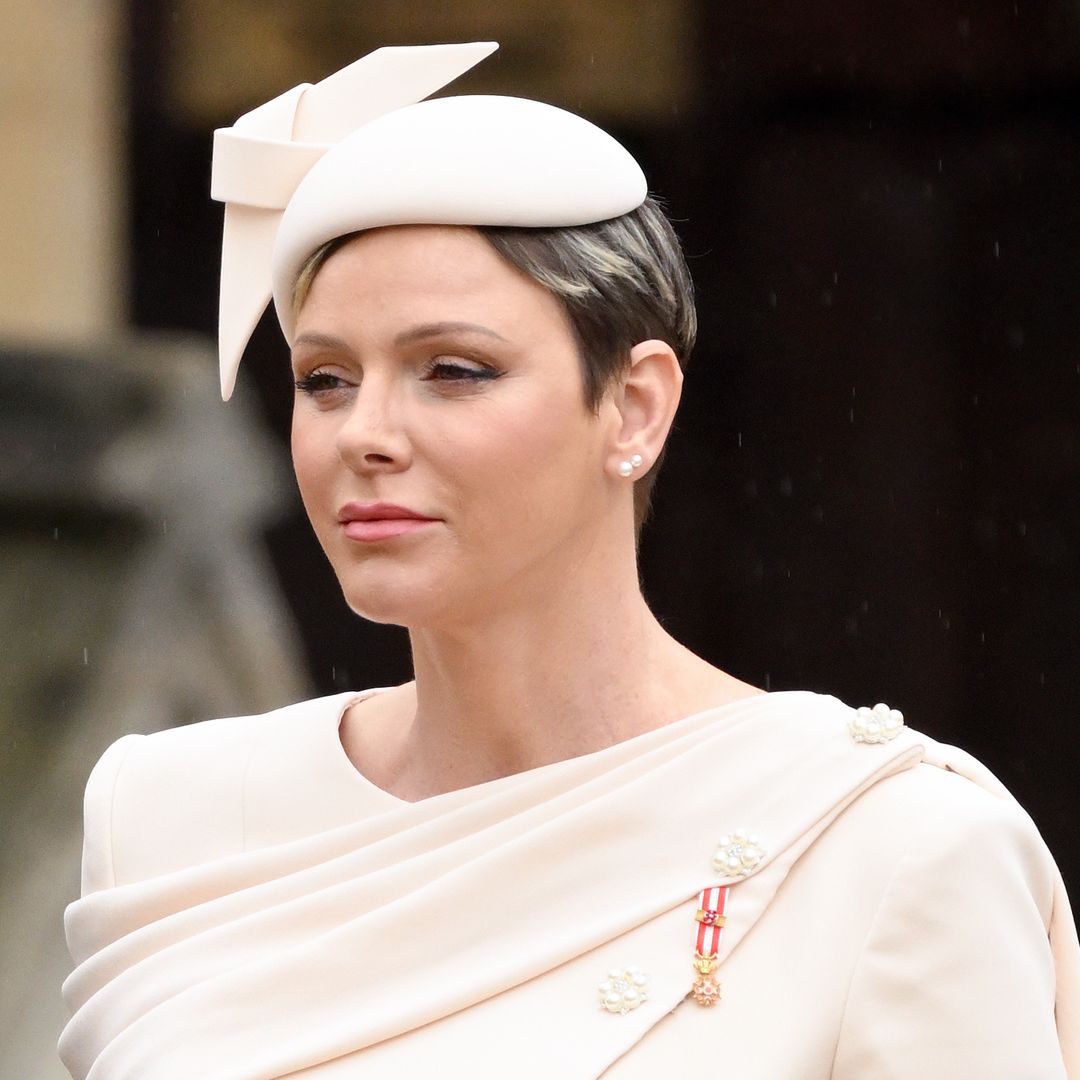 Princess Charlene dazzles crowds in candy colours and rarely-worn ...