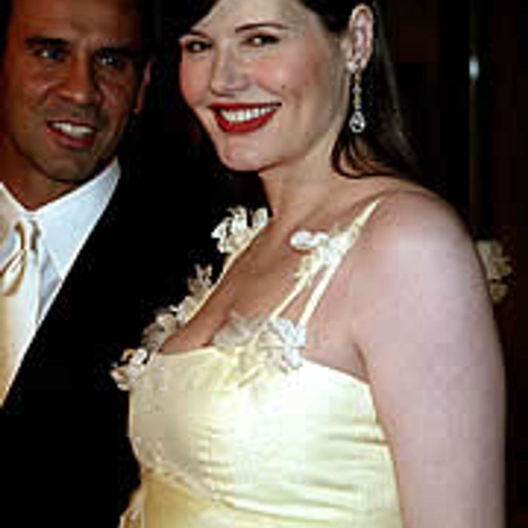 Geena Davis' hubby produces wedding pics to show they're married