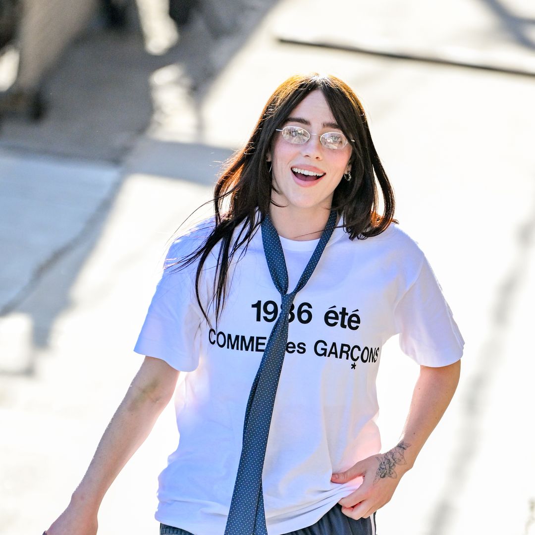 Billie Eilish rocks glossy chestnut locks and quirky schoolboy outfit in latest appearance