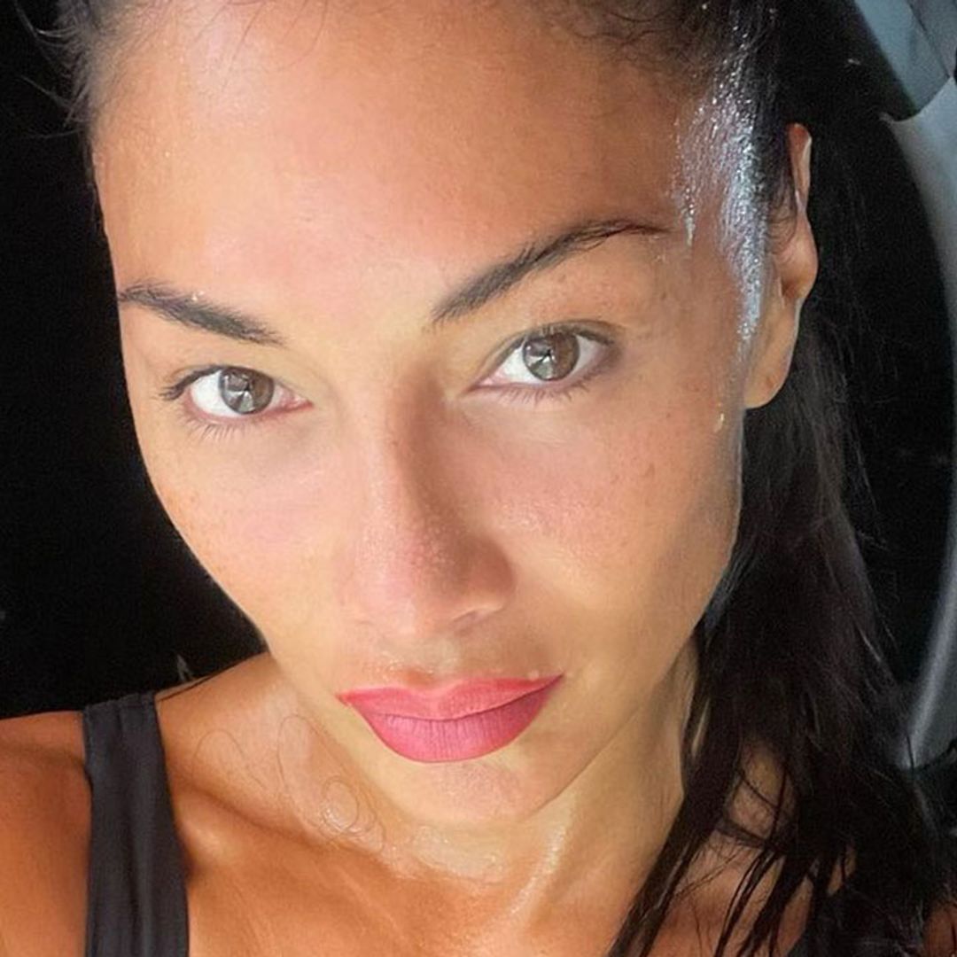 Nicole Scherzinger floors fans with sculpted abs in cheeky workout video