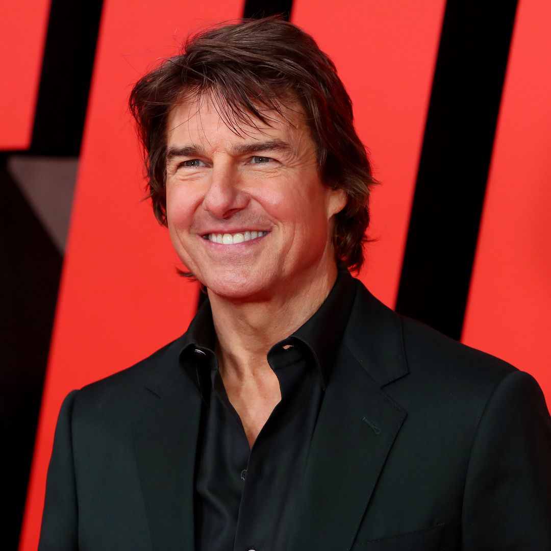 Tom Cruise celebrates 61st birthday at Mission Impossible premiere – and check out that cake!
