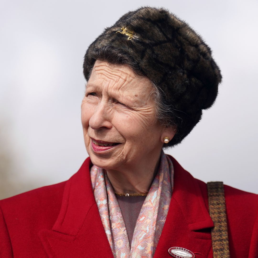 Princess Anne serves 80s fashion with structured shoulder pads and suede boots