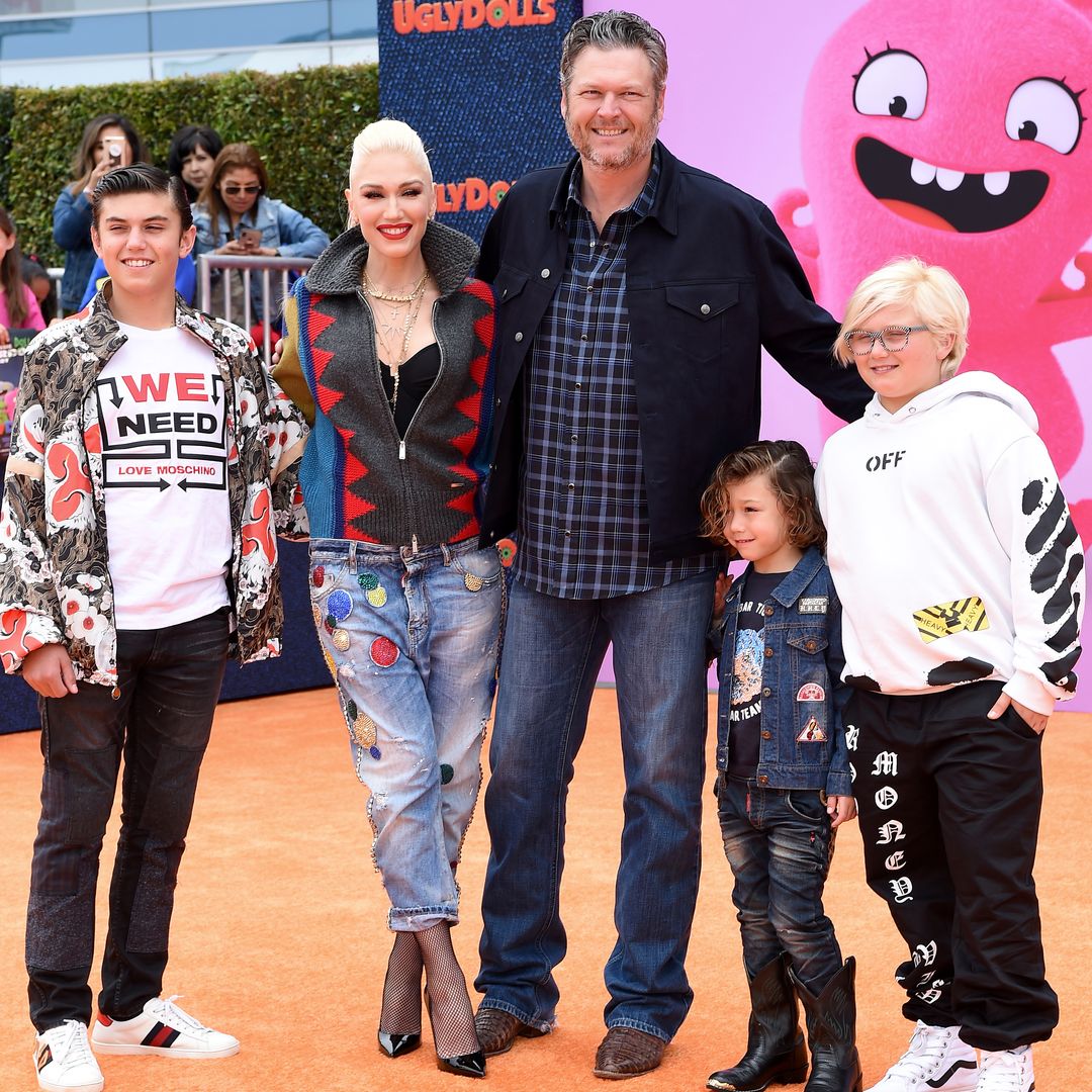 Blake, Gwen and their three boys at a red carpet event