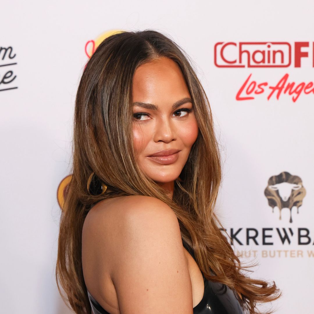 Chrissy Teigen showcases daring new back tattoo in latest photos