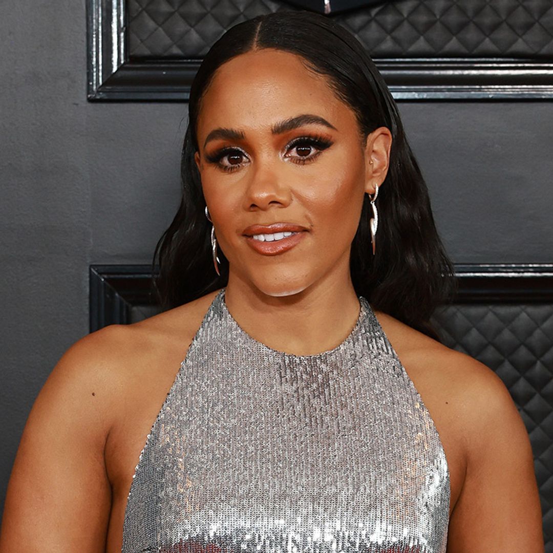 Alex Scott makes surprise appearance at the Grammys in figure-hugging daring dress