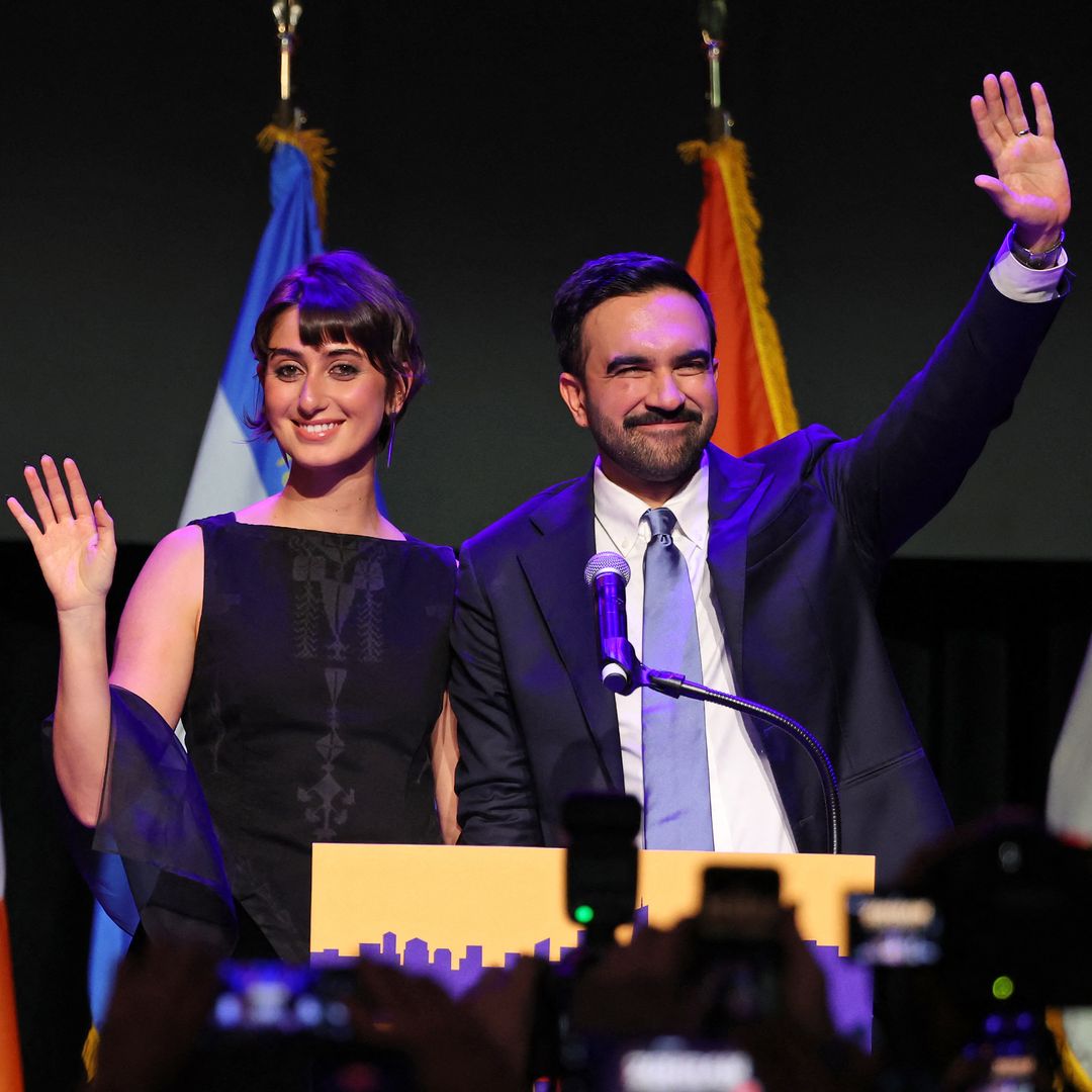 New York City Mayoral candidate Zohran Mamdani  (R) celebrates alongside his wife Rama Duwaji (L) during an election night event at the Brooklyn Paramount Theater in Brooklyn, New York on November 4, 2025. New Yorkers elected leftist Zohran Mamdani as their next mayor November 4, 2025 broadcasters projected, on a day of key local ballots across the country offering the first electoral judgement of Donald Trump's tumultuous second White House term.
