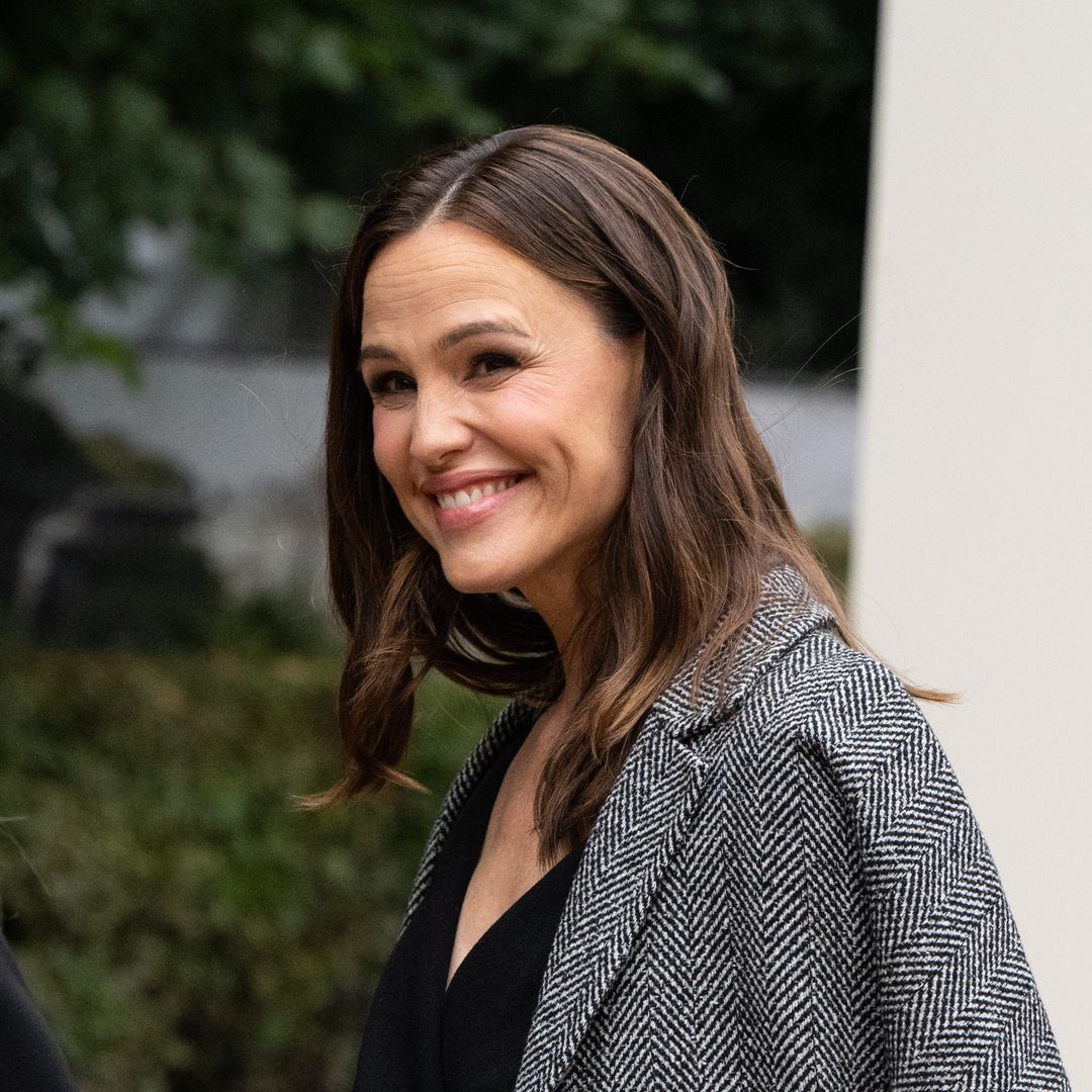 Jennifer Garner twins with boyfriend John Miller as they beam during rare appearance together