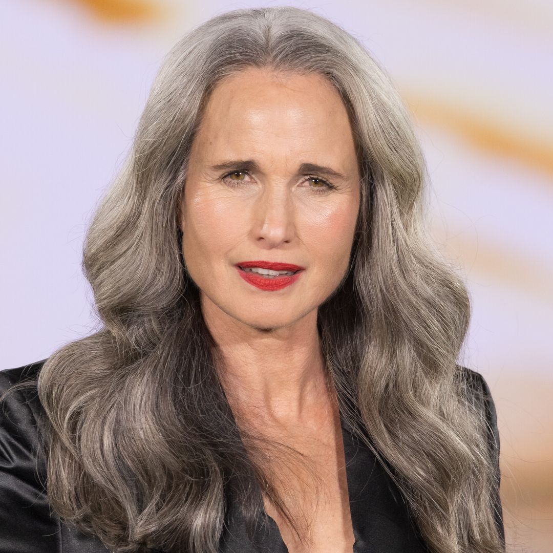 Andie McDowell walks the runway at the L'Oréal Paris Spring/Summer 2026 show with a perfect Griege hue. 