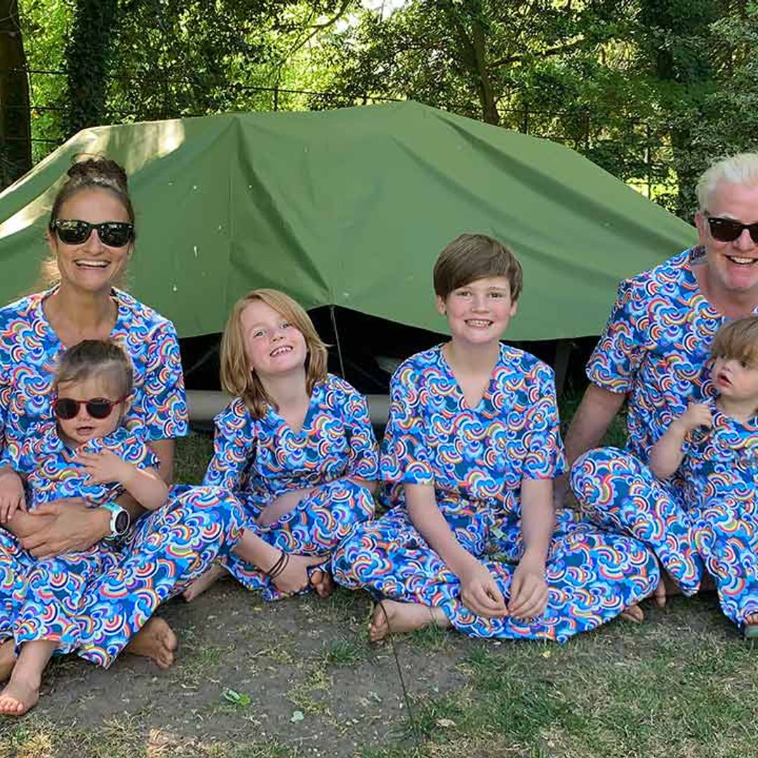 Exclusive: Chris Evans and family pose in matching scrubs as radio star reveals pride in son Noah