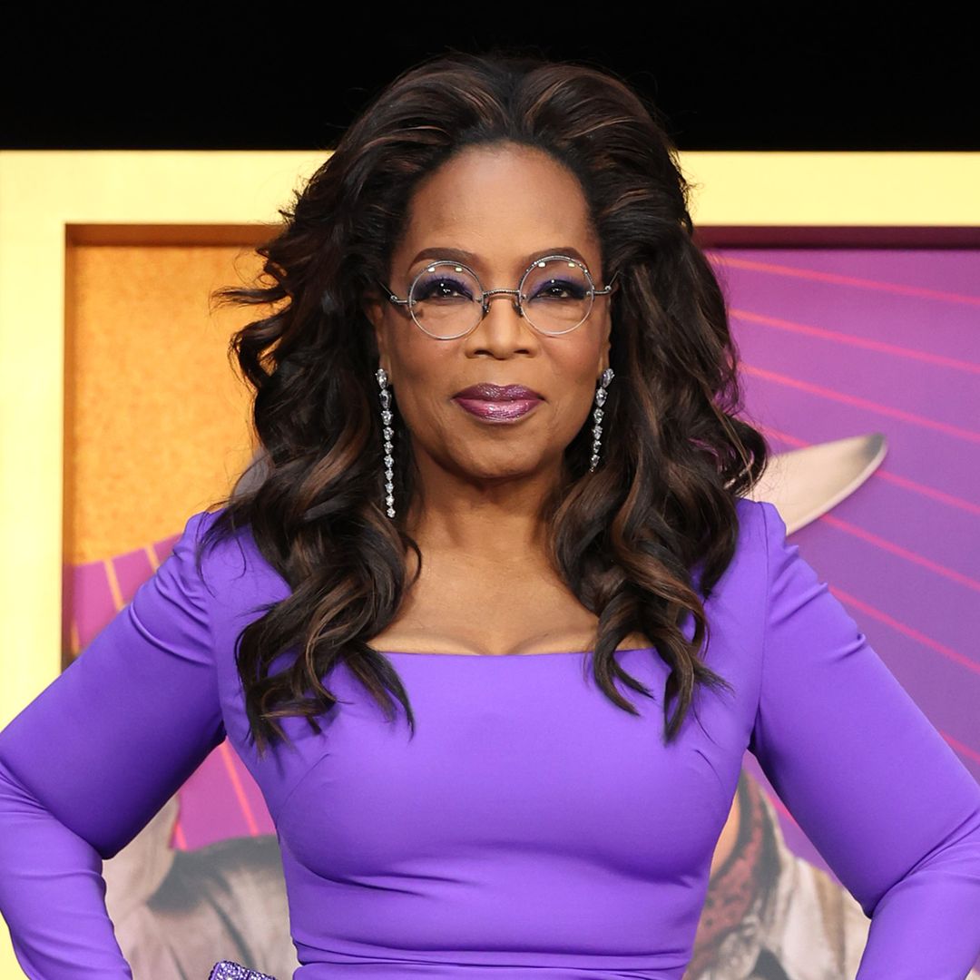 Oprah Winfrey looks slimmer than ever in figure-hugging wedding guest dress