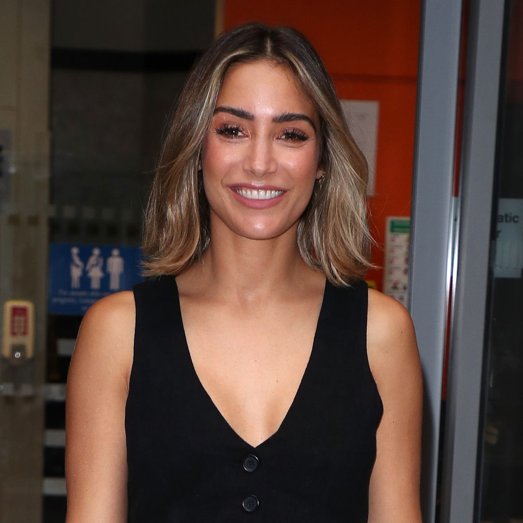 Frankie Bridge stuns in ab-baring vest and low-rise trousers
