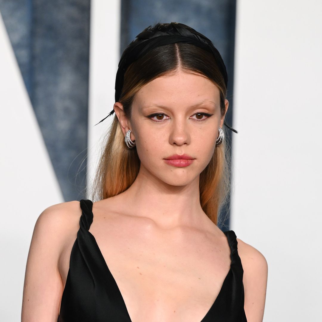 Mia Goth embodies her namesake in a sultry leather 'goth' look