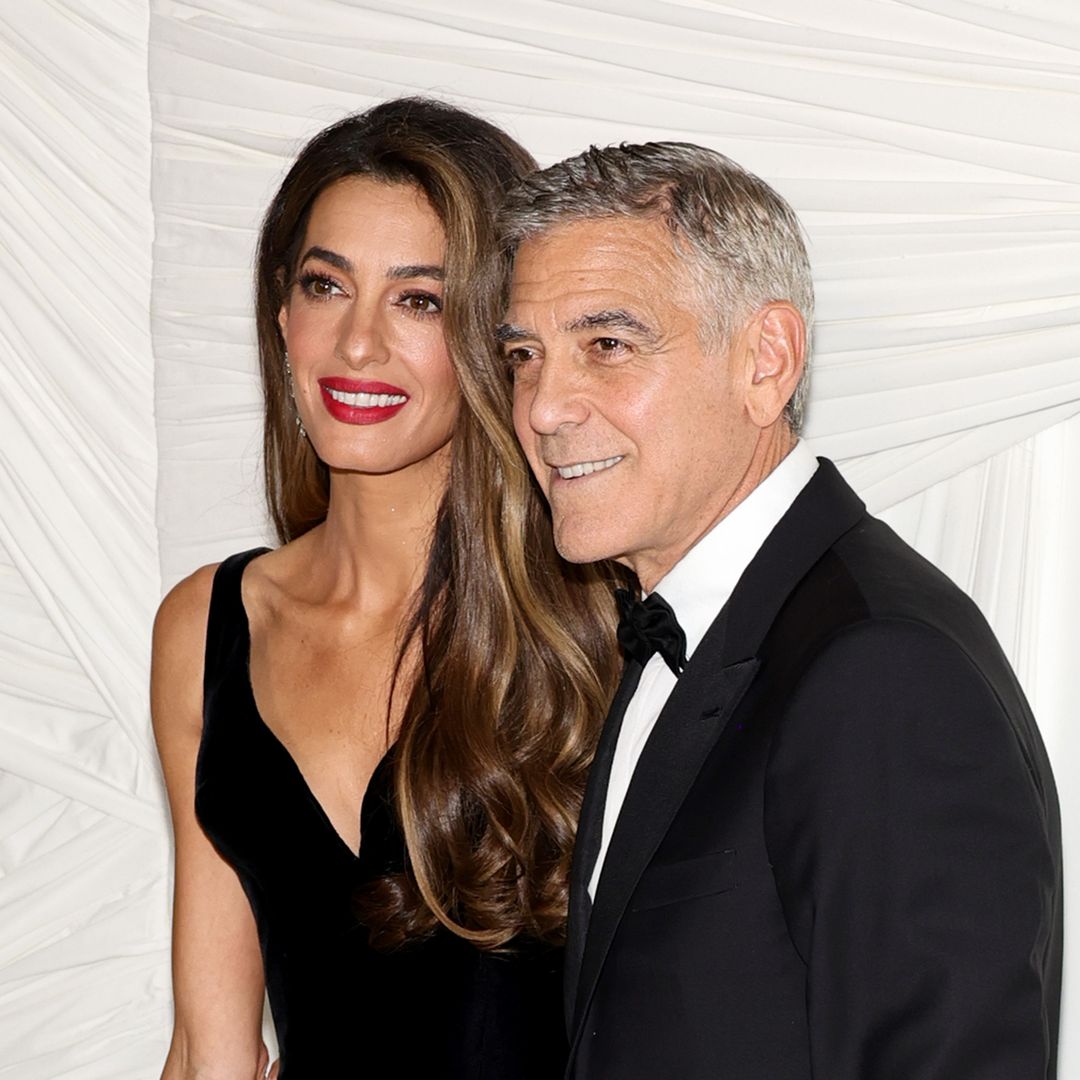 Amal Clooney oozes glamour in slinky gothic gown ahead of surprise secret getaway