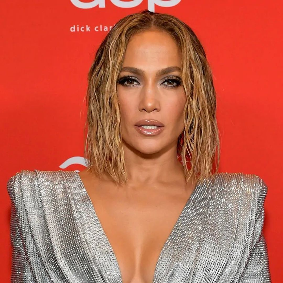 Jennifer Lopez bares abs as she wows in white PVC cropped top and pants