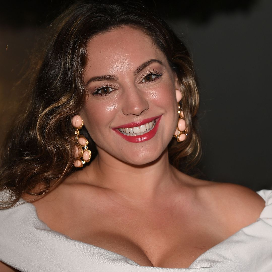 Kelly Brook just wore the most flattering striped bikini we ever saw