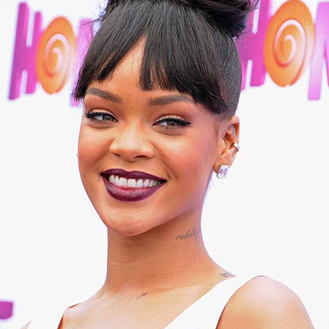Rihanna shows off demure side at glitzy premiere