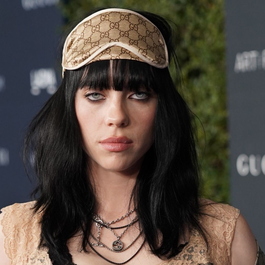 Billie Eilish steals the show in lace gown and see-through tights - but her date drives fans wild