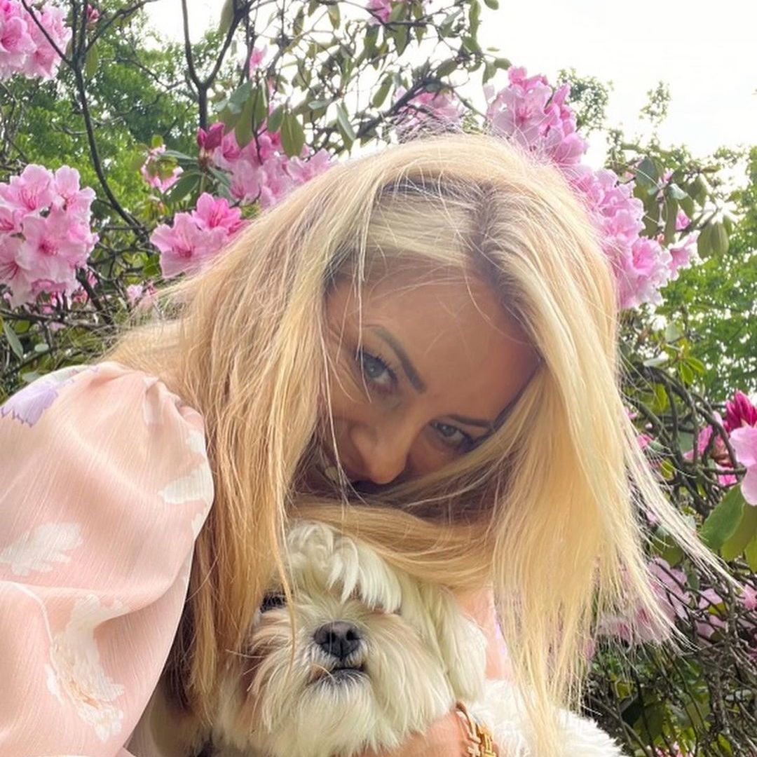 Tess Daly's daughter Phoebe, 17,  towers over her in rare family photo to celebrate milestone