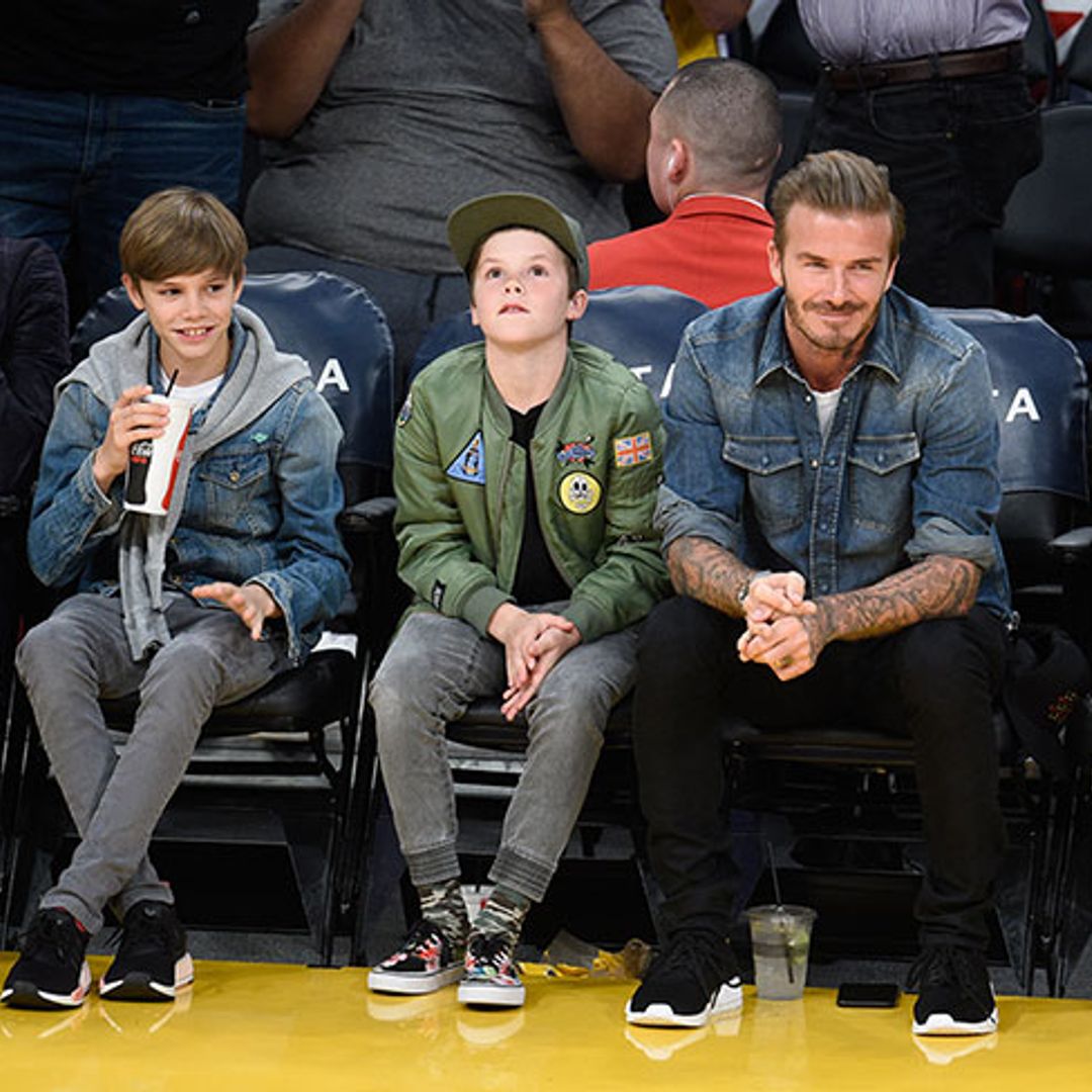 Cruz Beckham gets into the spirit of things at basketball with dad David