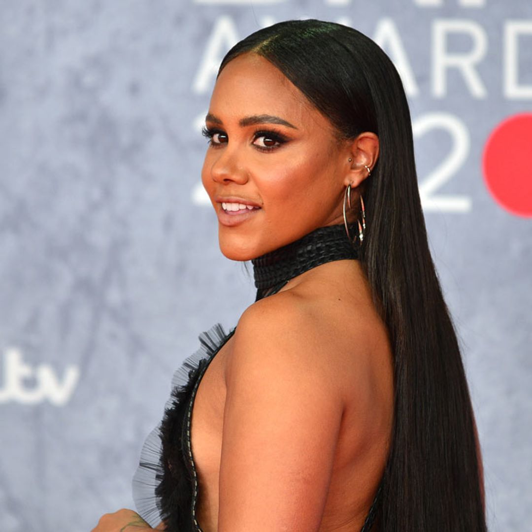 Alex Scott poses up a storm in gorgeous backless dress