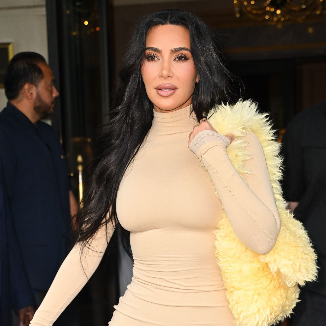 Kim Kardashian's bodycon dress and boots look is giving us major autumn fashion inspo