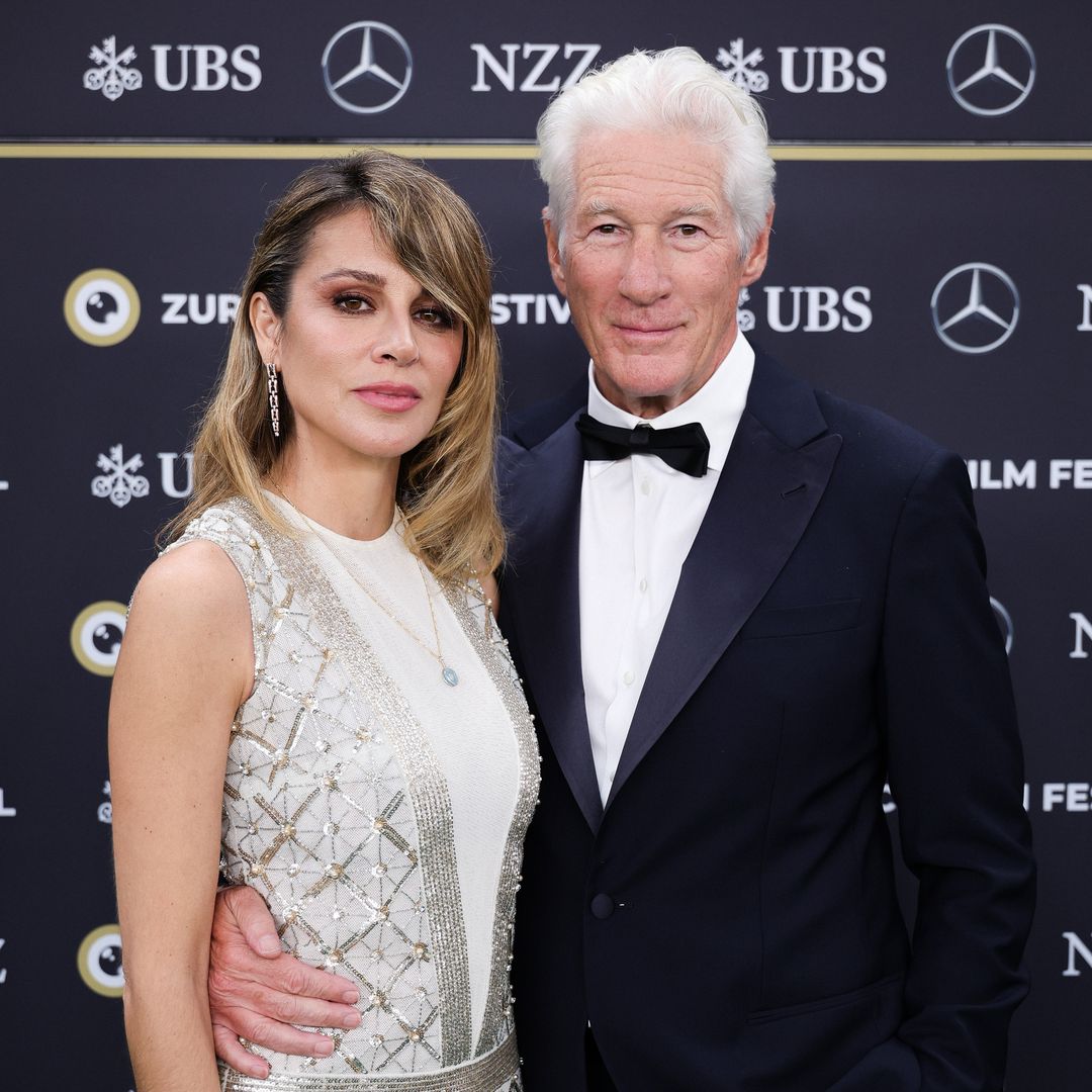 Richard Gere, 75, can't keep his hands off wife Alejandra, 41, as she wears bridal gown for red carpet