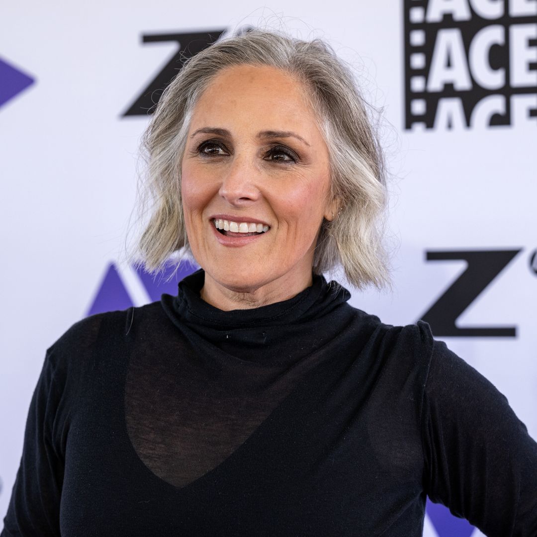Ricki Lake flaunts fabulous new physique in leather mini and sheer shirt