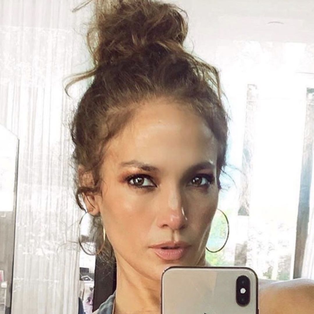 Jennifer Lopez showcases her bikini body and washboard abs in incredible swimsuit selfie