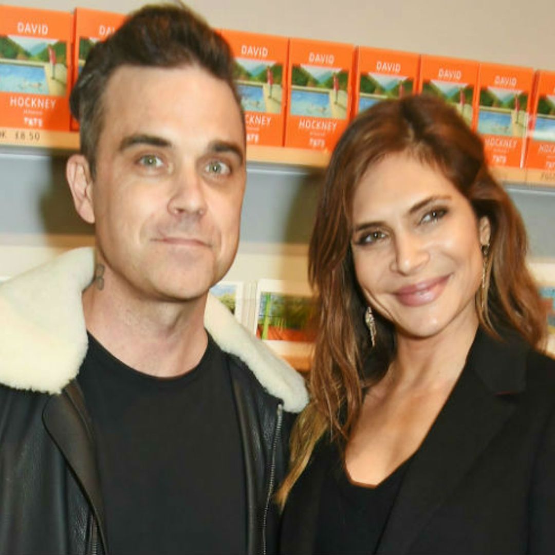 Robbie Williams and Ayda Field enjoy day out with daughter Teddy in rare family photo