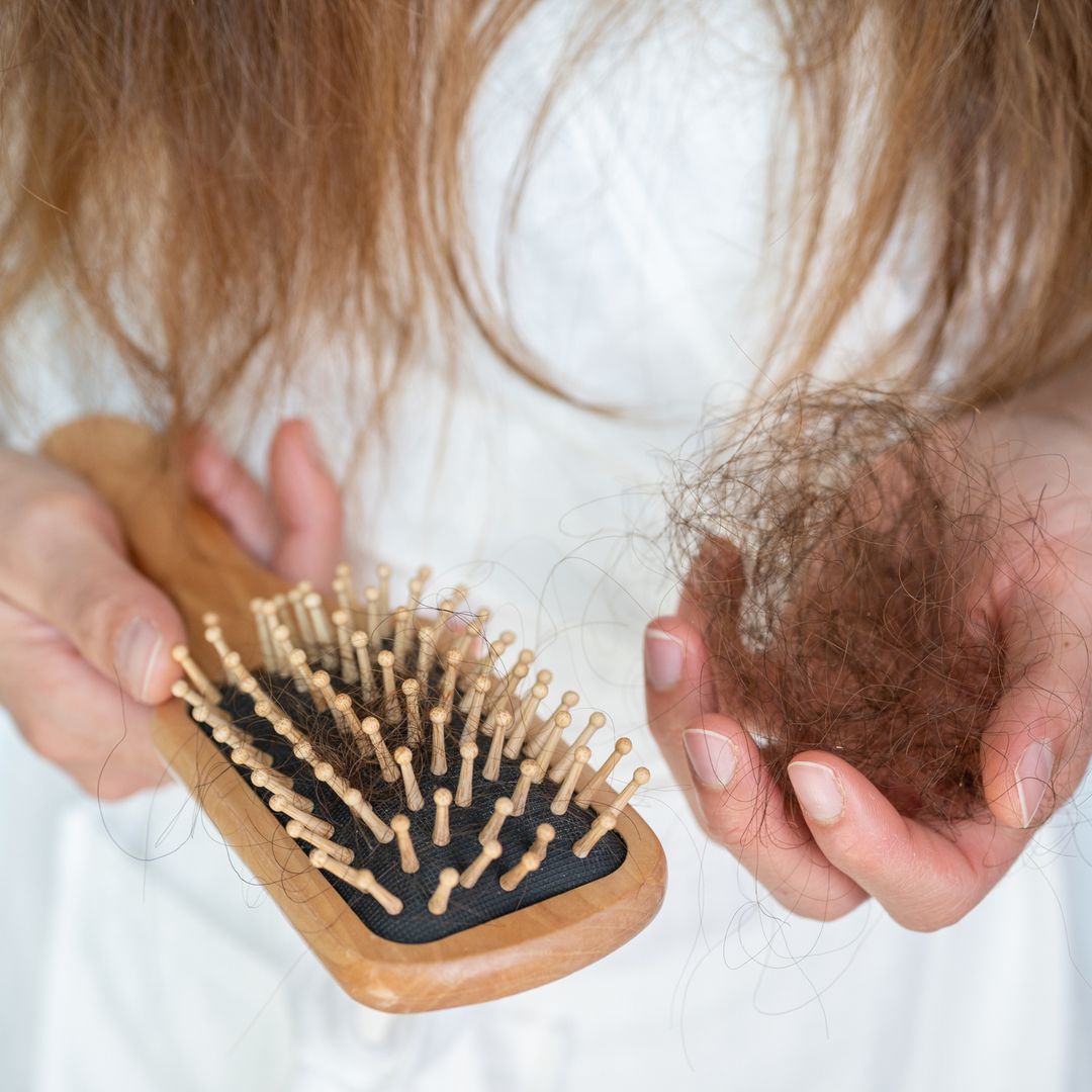 Here's when you should be concerned about hair shedding, according to a beauty expert