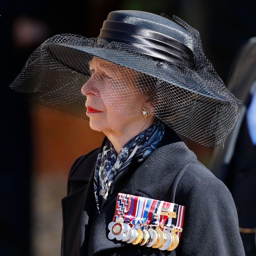 Princess Anne exudes royal glamour in knee-high boots and tailored dress