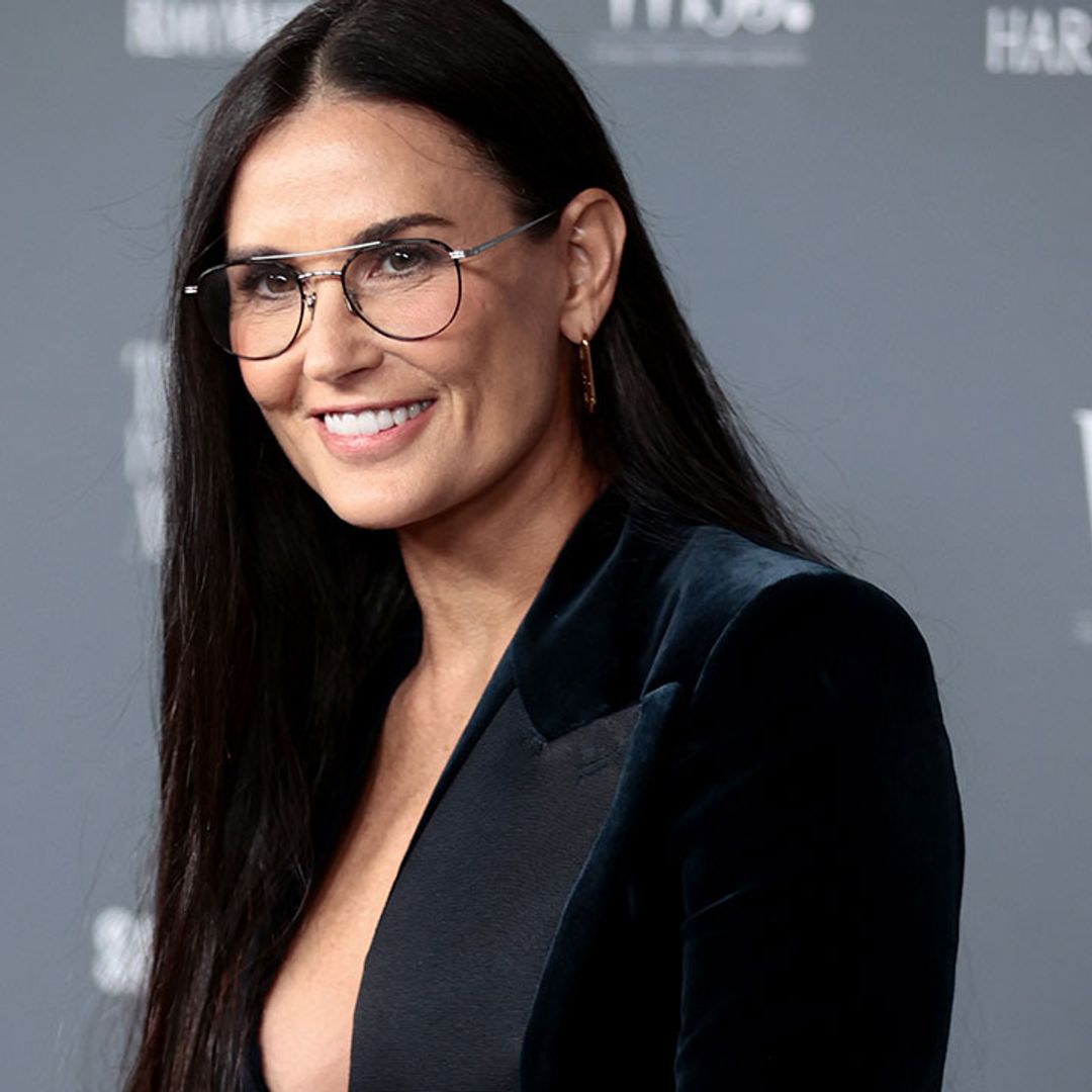 Demi Moore stuns in lacy bra and figure-hugging suit at star-studded event