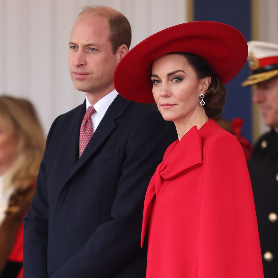 Princess Kate is every inch a future queen in spectacular scarlet outfit and ruby heels