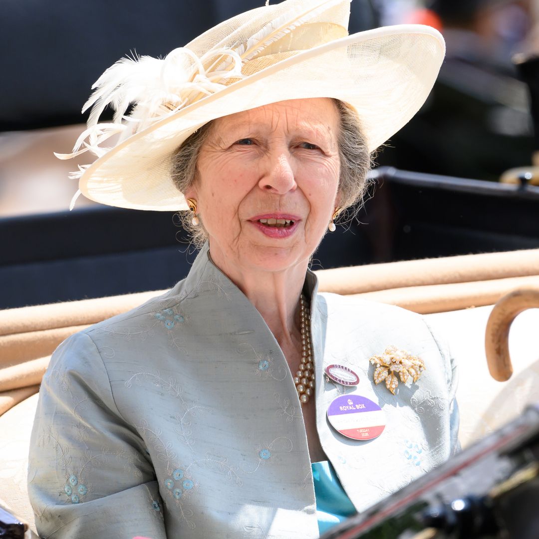 Princess Anne battles soaring temperatures in iconic Ascot silk wrap top – and leather gloves