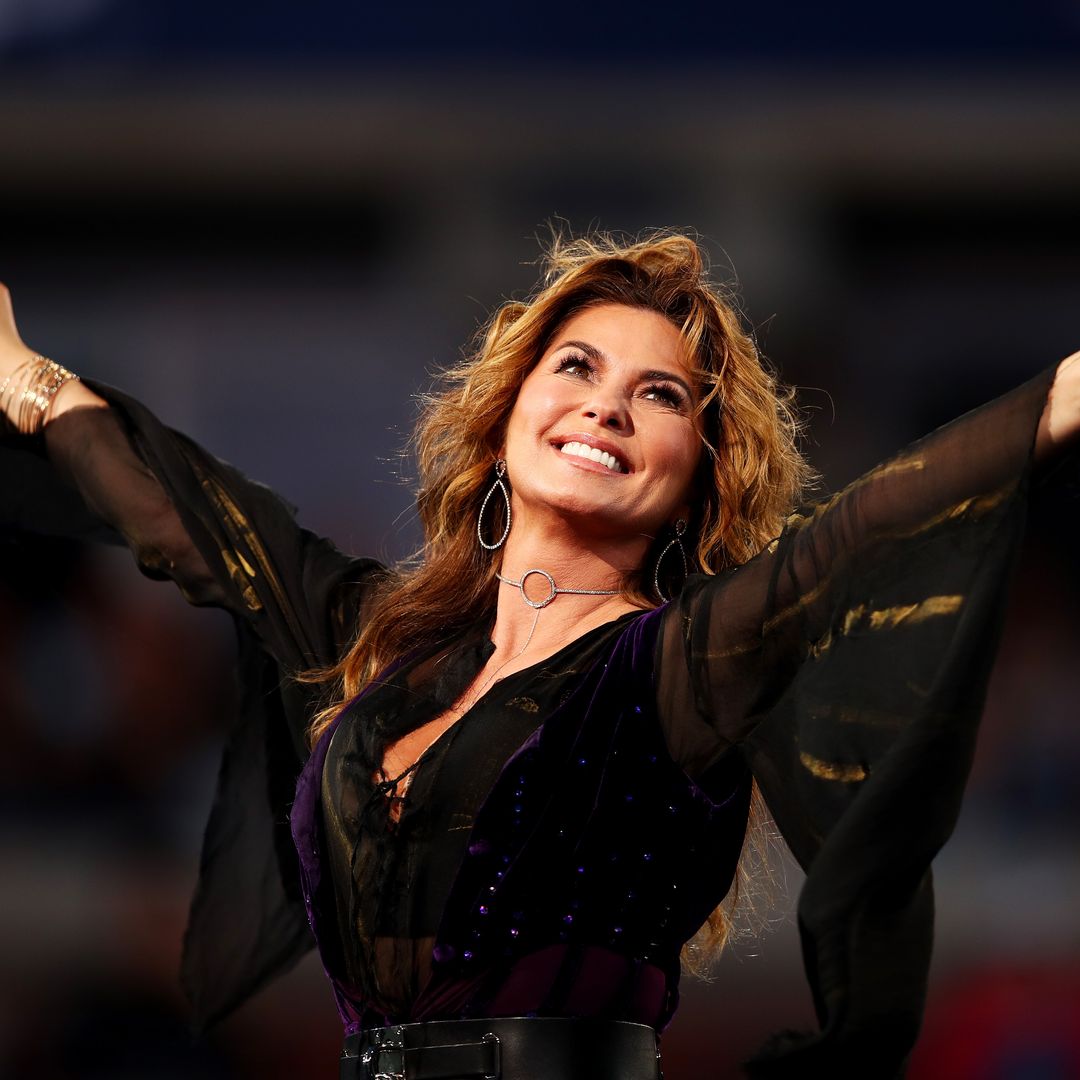 Shania Twain looks phenomenal in thigh-high boots and mini dress as she celebrates milestone with husband
