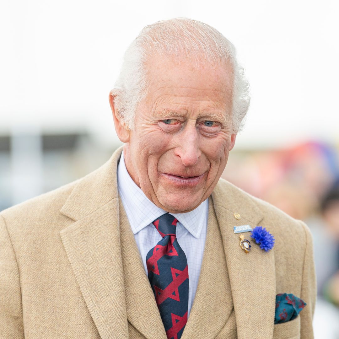 King Charles braves the rain for solo appearance at event loved by late royal