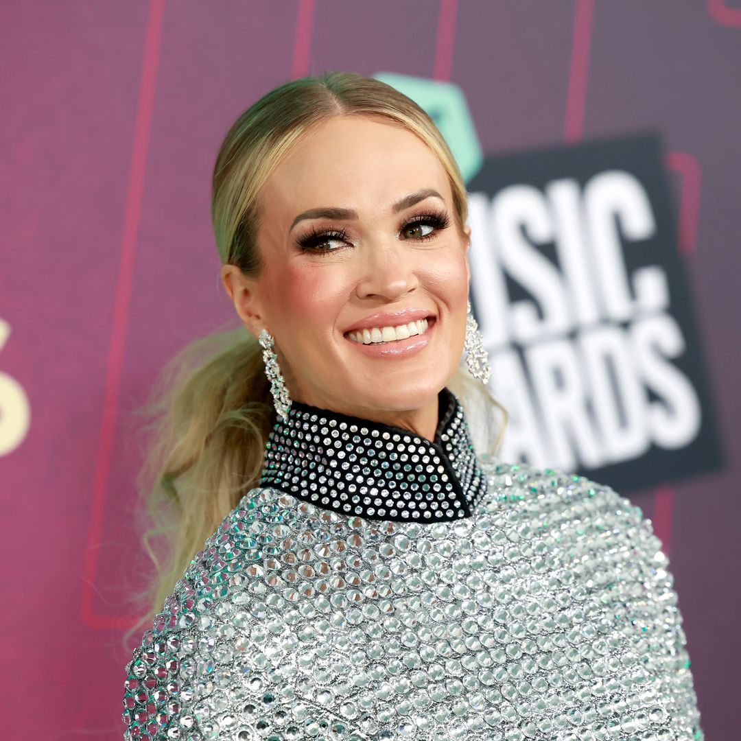 Carrie Underwood shares rare photo of husband and sons during break from performing