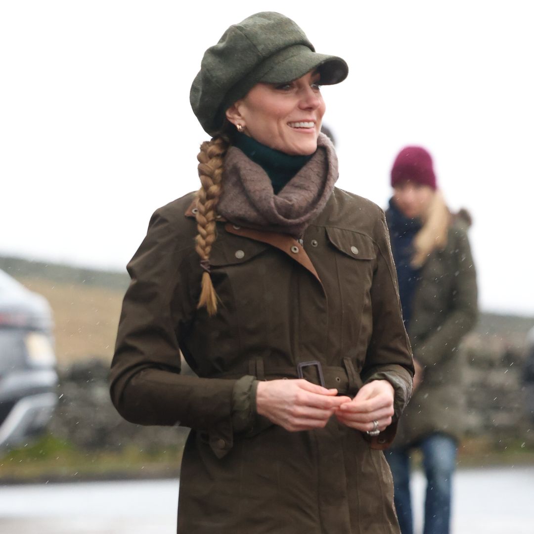 'Undaunted' Princess Kate shrugs off stormy weather as she motivates hikers