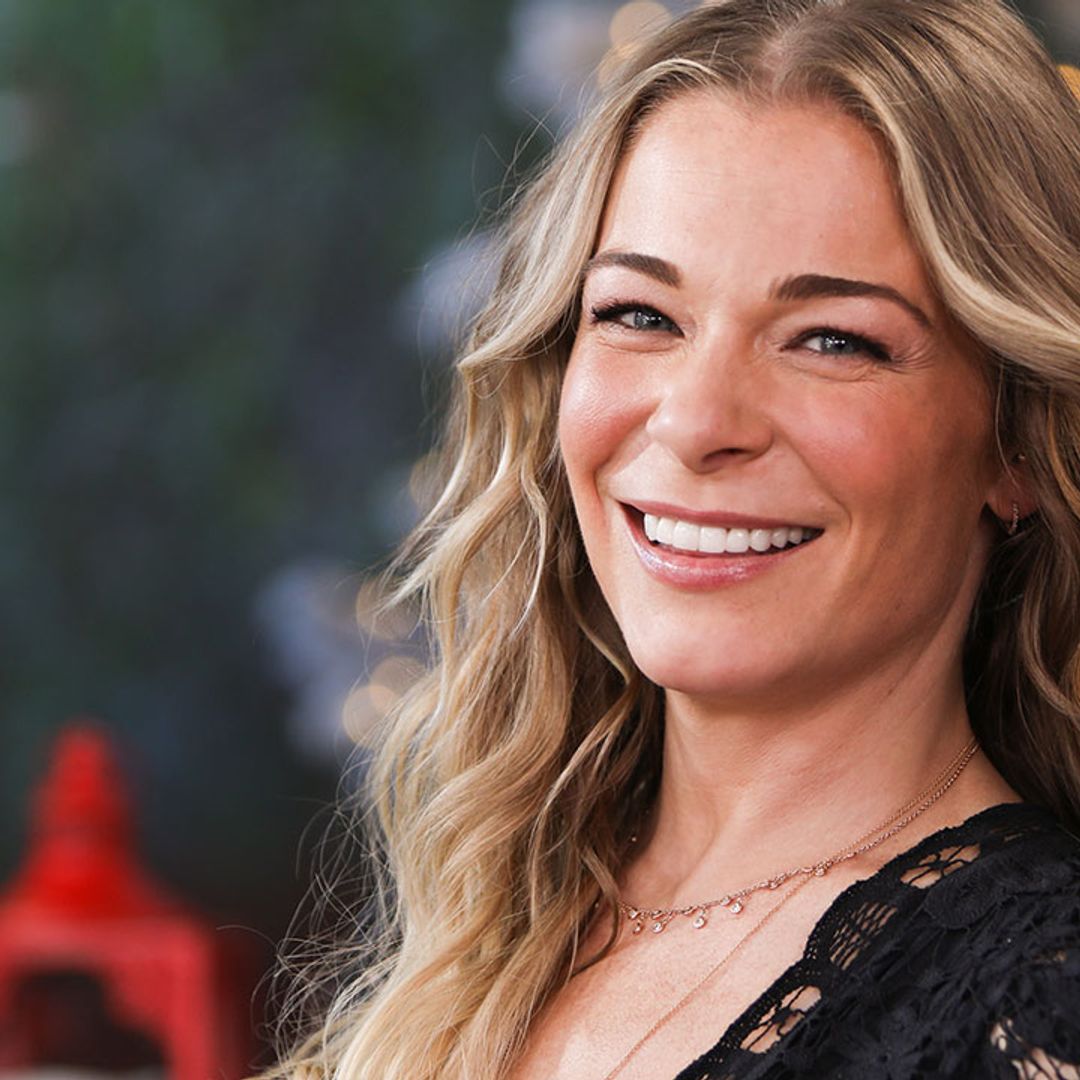 LeAnn Rimes looks phenomenal in daringly low lace dress