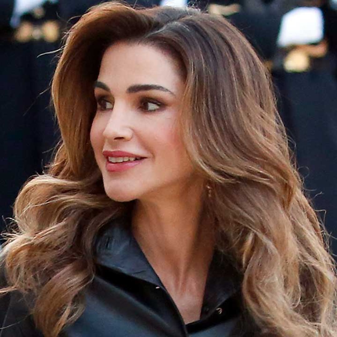 Queen Rania is the picture of elegance in tailored coat dress and snakeskin heels