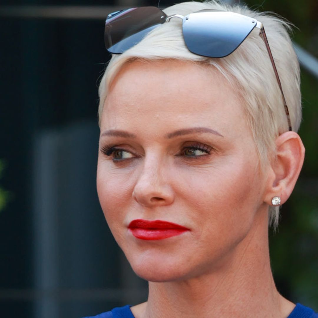 Princess Charlene is a modern Audrey Hepburn in fitted monochrome dress