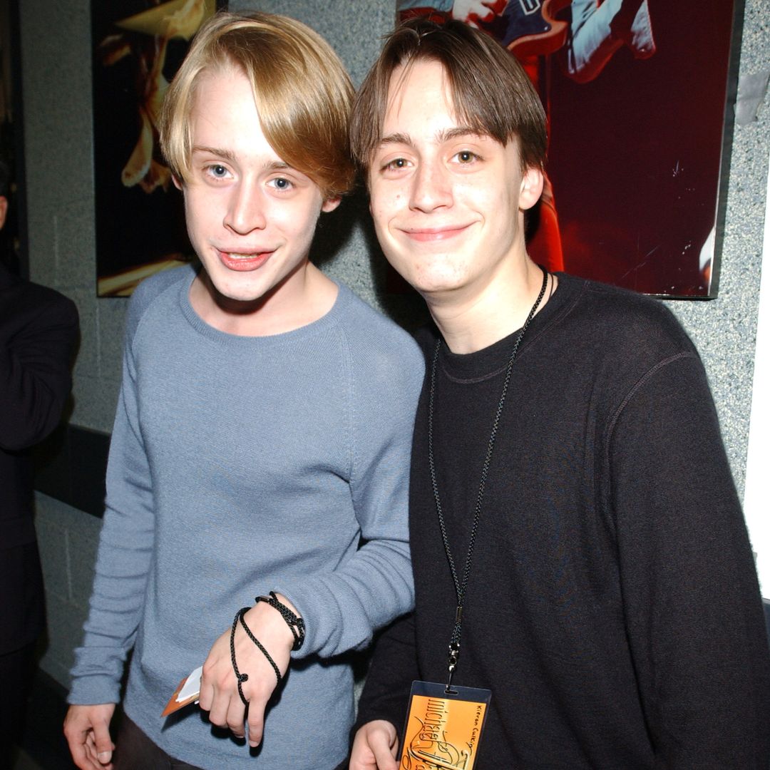 Kieran and Macaulay Culkin smiling on a red carpet