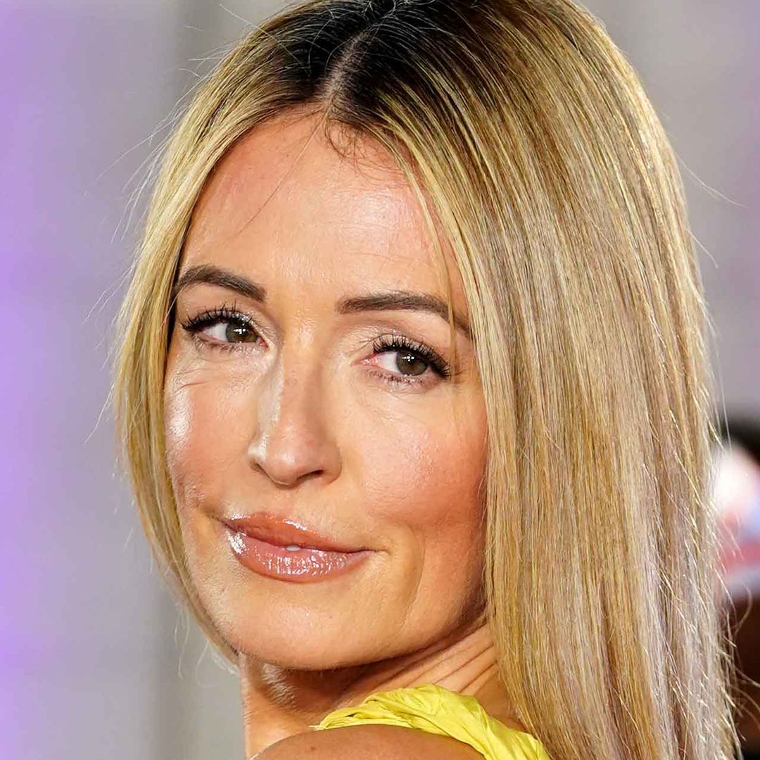 Cat Deeley's wearing the off-duty mum aesthetic I live in - a striped shirt and jeans